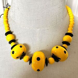 Rosecraft yellow and black beaded necklace